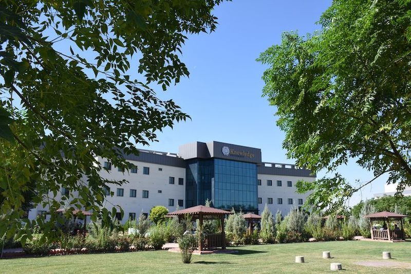 Knowledge University building and campus gardens